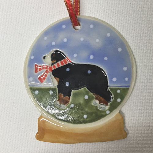 Berner wearing red scarf on ornament