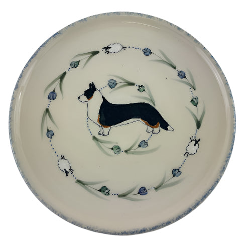 10 inch round platter with blue sponged rim, tri colored corgi , tulips and sheep